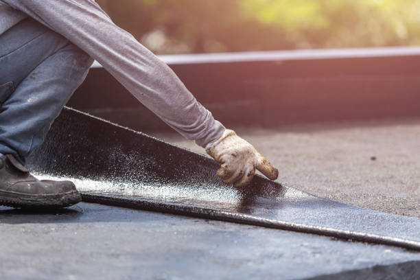 Professional Waterproofing technician working in Custer, MI